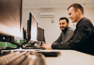 HR professional reviewing resumes for manpower solutions
